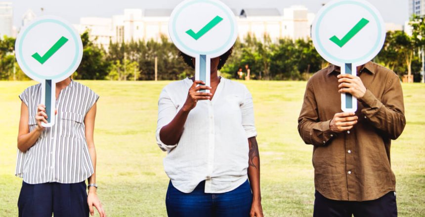 Types of SEO represented by 3 people holding signs